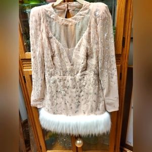 Fancy Dress! Faux Fur Hem. Sheer at cleavage and back. Embroidered at base dress